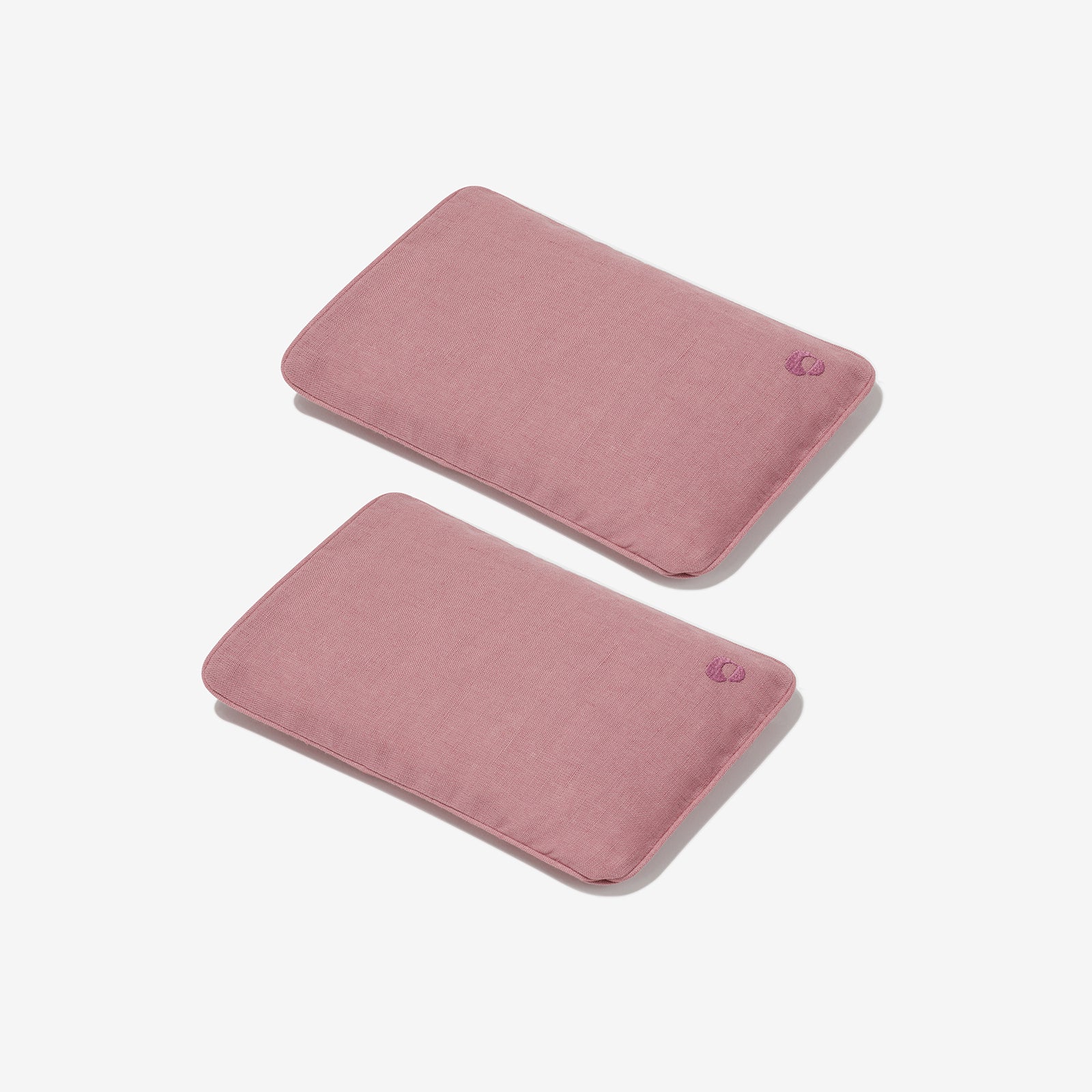 zestaw dwóch lnianych termoforów z pestkami wiśni w kolorze różowym